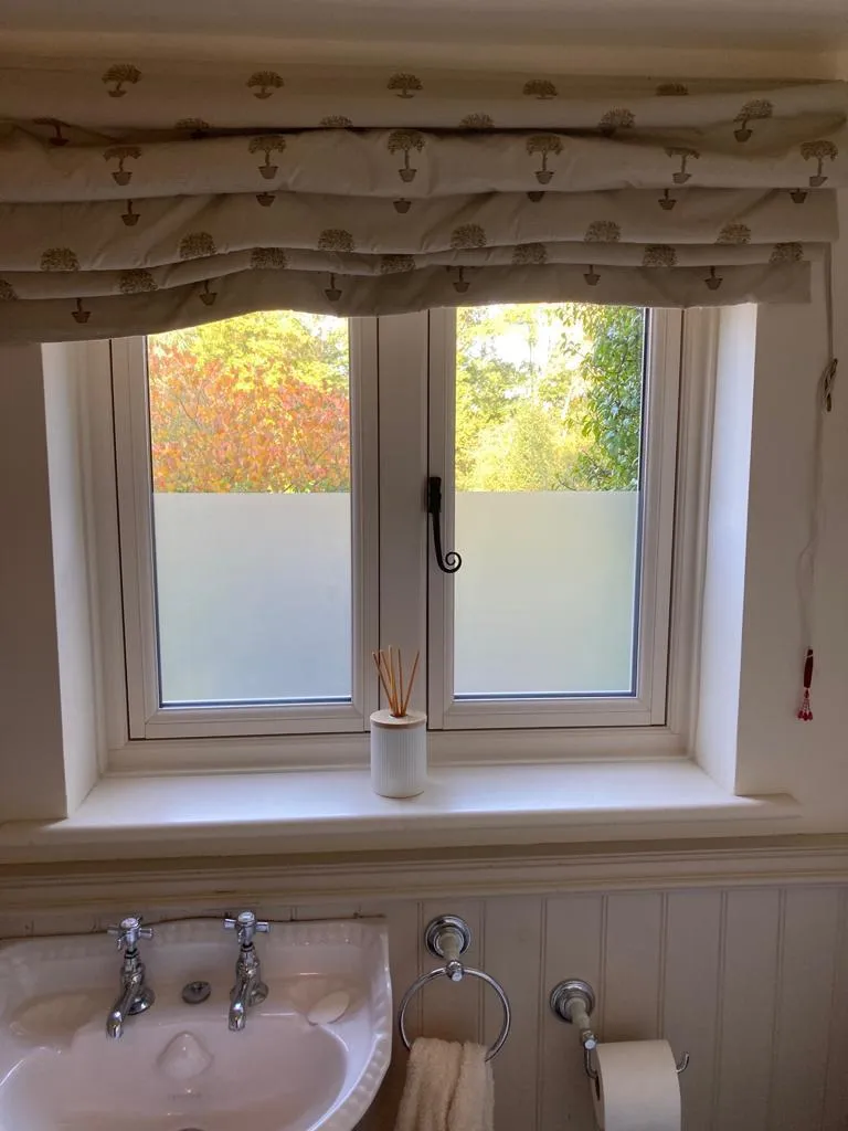 White window with obscure glazing in a bathroom